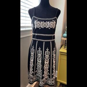 INC size 8 dress. Beautiful black and off white design, lined, zip closure.